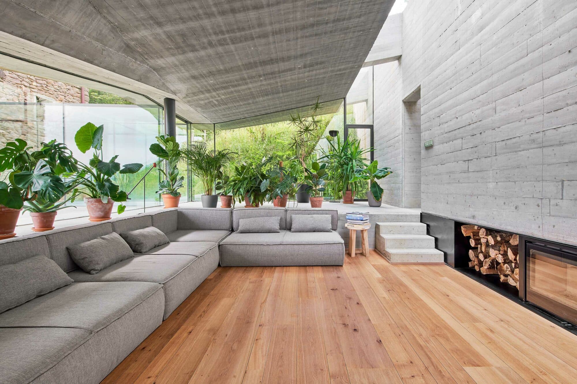 Custom sound-proof installation of Parklex Prodema interior wood flooring in the Landaburu Borda rural home, by Jordi Hidalgo Tané.