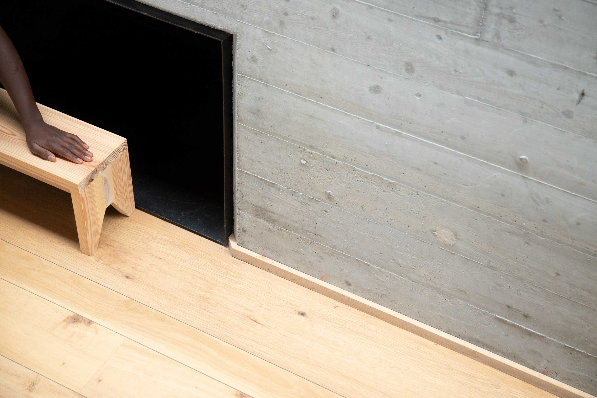 Lath detail for joints between Parklex Prodema wooden flooring and interior panelling in the Landaburu Borda rural house