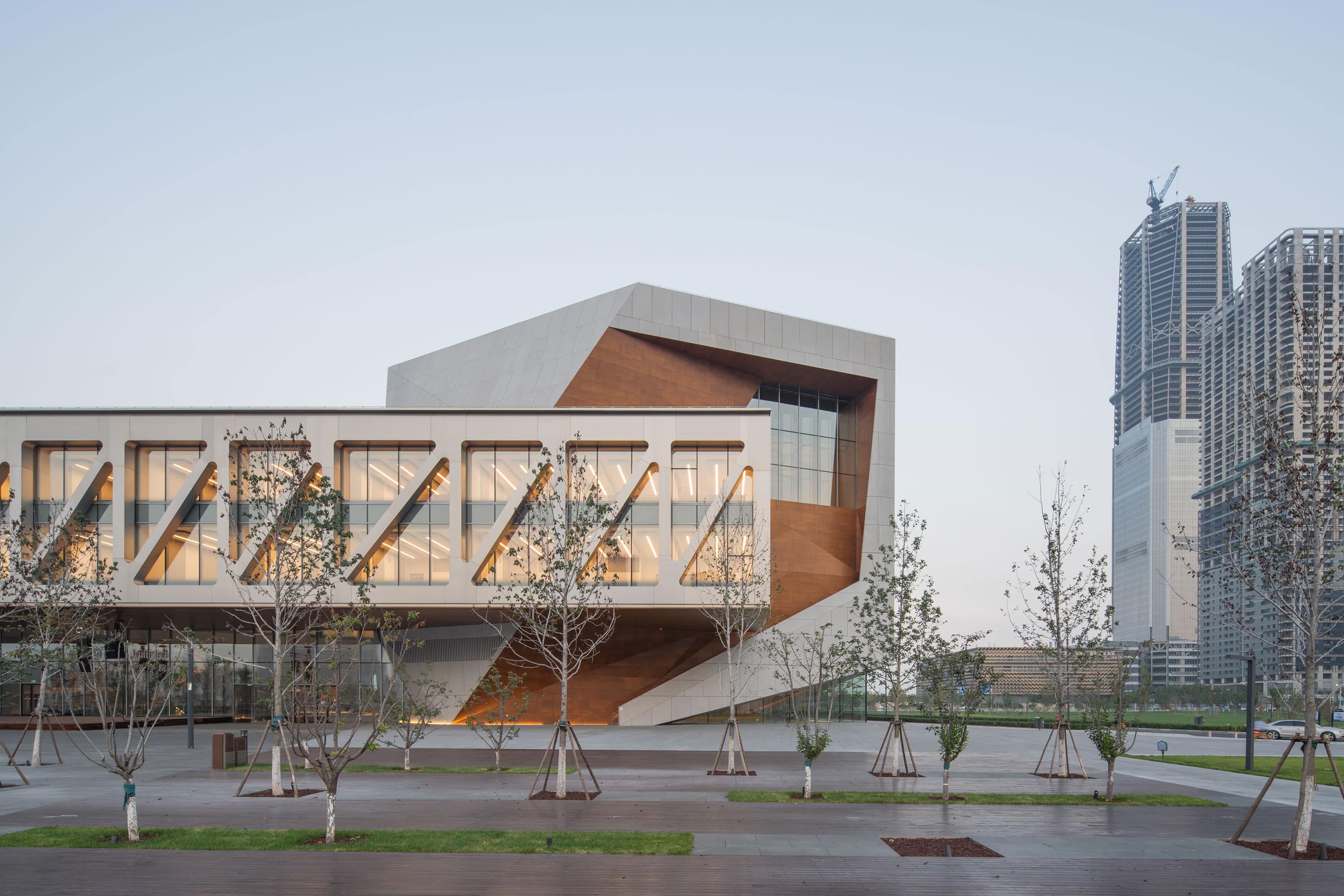 Diller Scofidio + Renfro chose Parklex Prodema timber soffit and cladding for the outdoors of the Juilliard music school in Tianjin