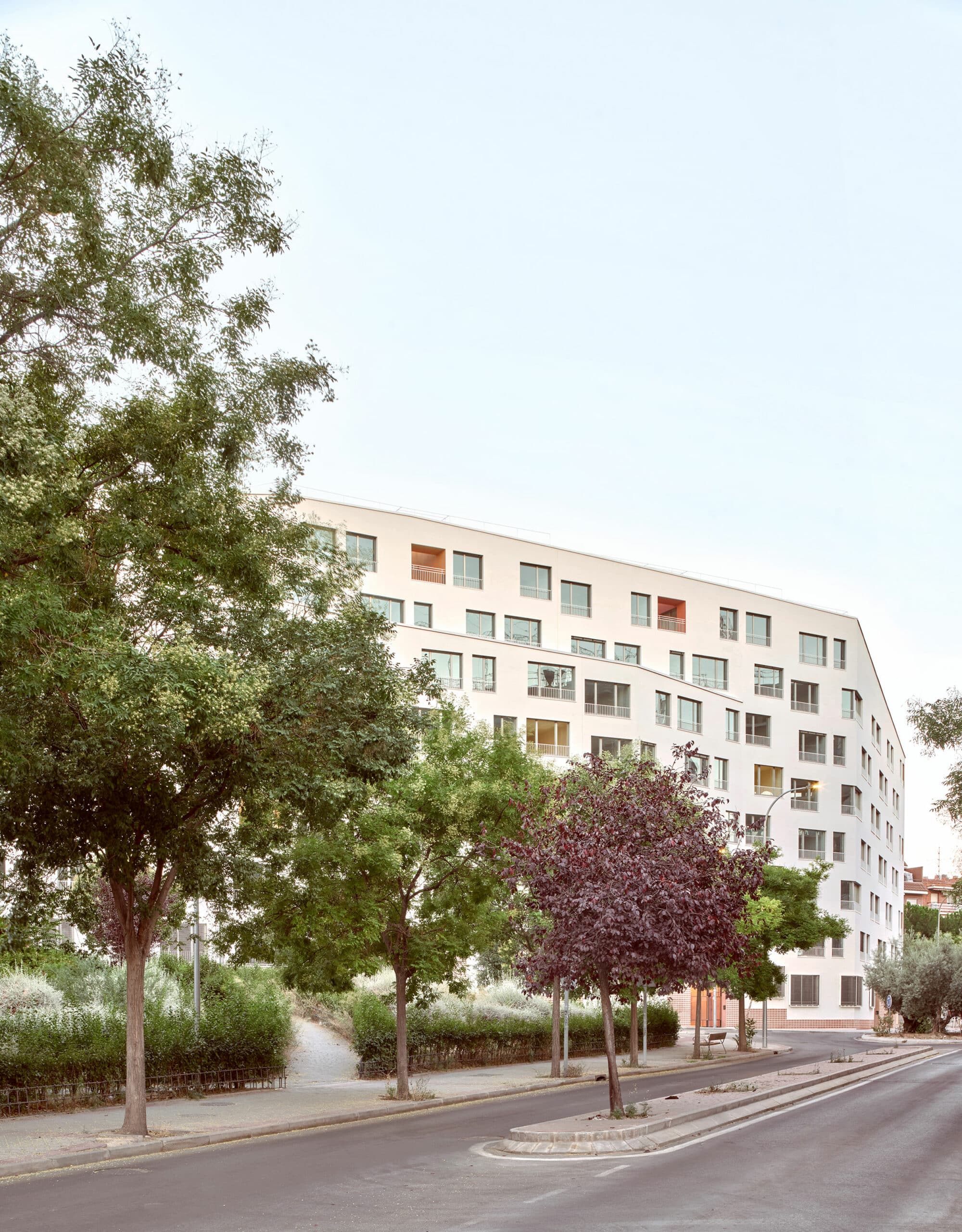 Parklex Prodema natural wood soffit has been used in the outdoor communal areas of this 106-unit building by MARMOLBRAVO and MADhel Architects.