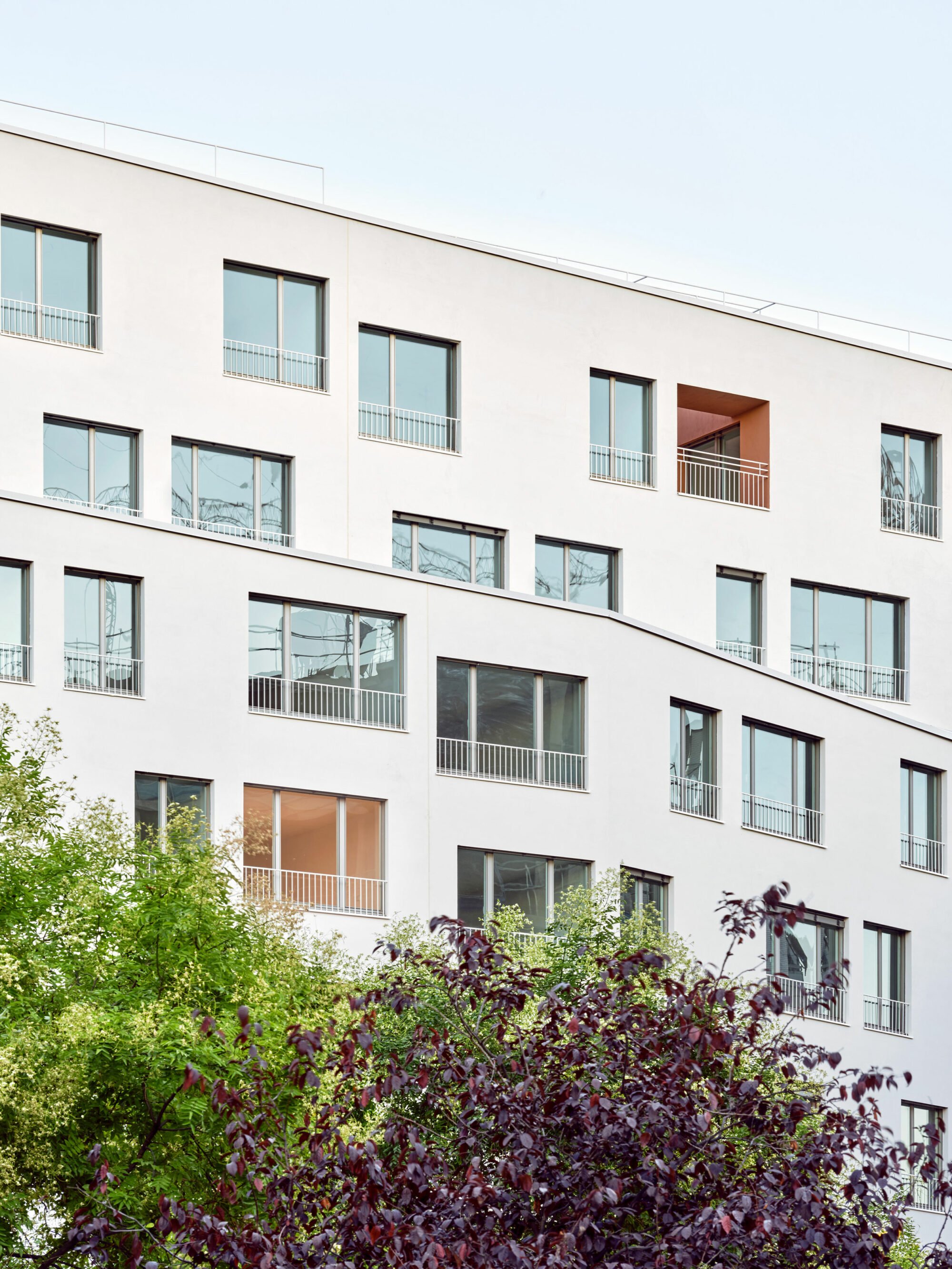 Parklex Prodema natural wood soffit clads the exterior communal areas in the 106-apartment building by MARMOLBRAVO and MADhel Architects.