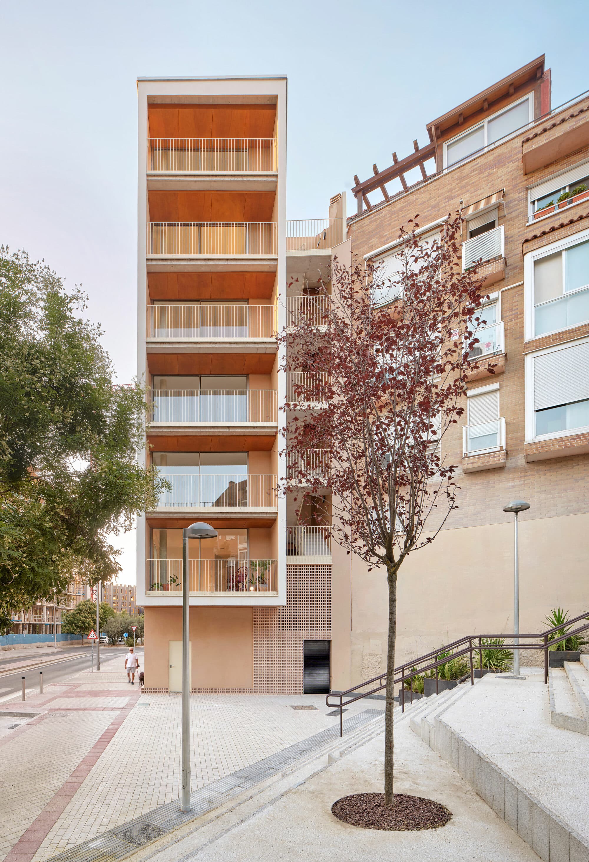Parklex Prodema natural wooden soffit adds warmth to the balconies at the SFJ6 building by MARMOLBRAVO and MADhel Architects.