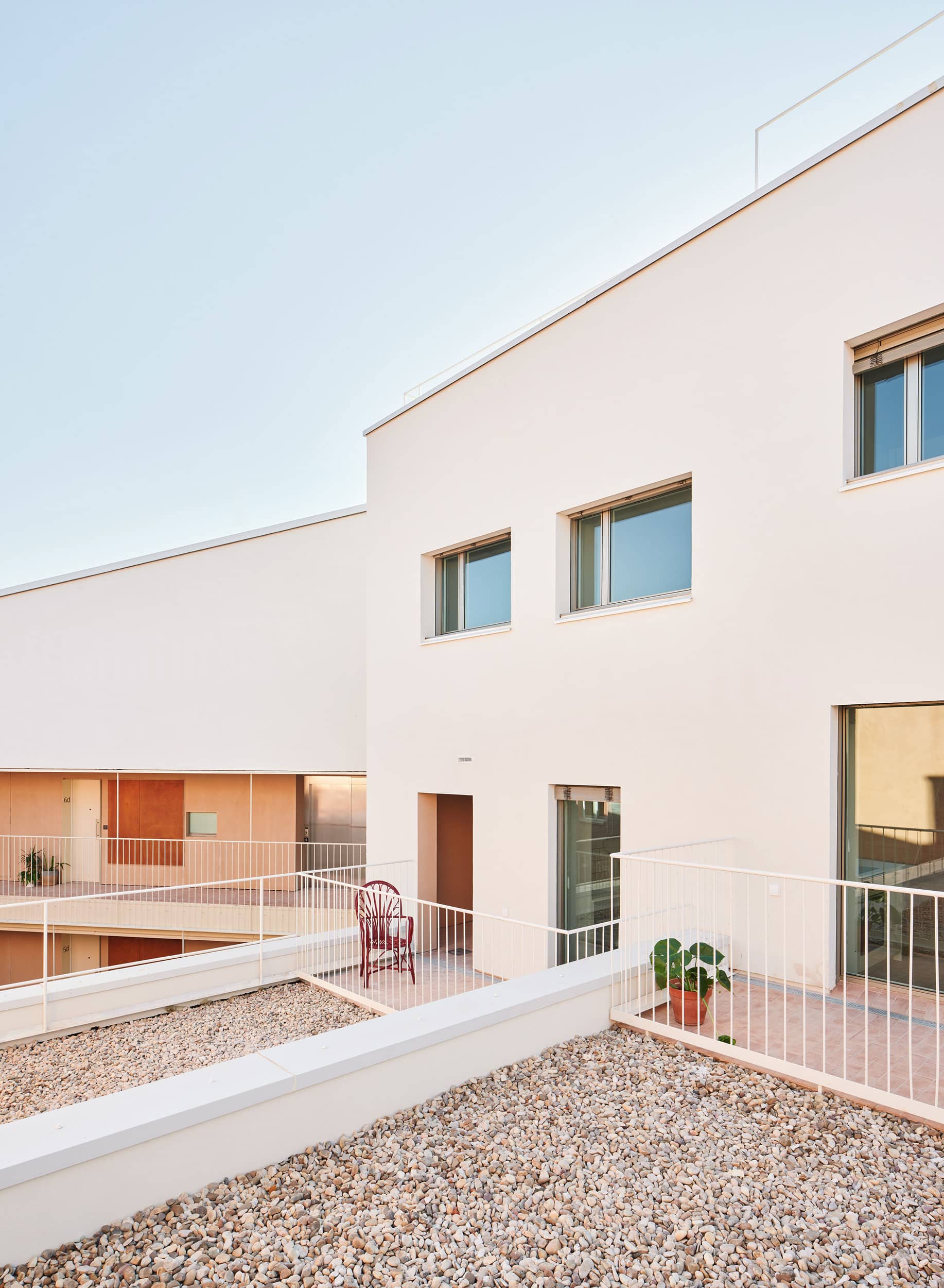Parklex Prodema natural wood soffit clads the exterior communal areas in the 106-apartment building by MARMOLBRAVO and MADhel Architects.
