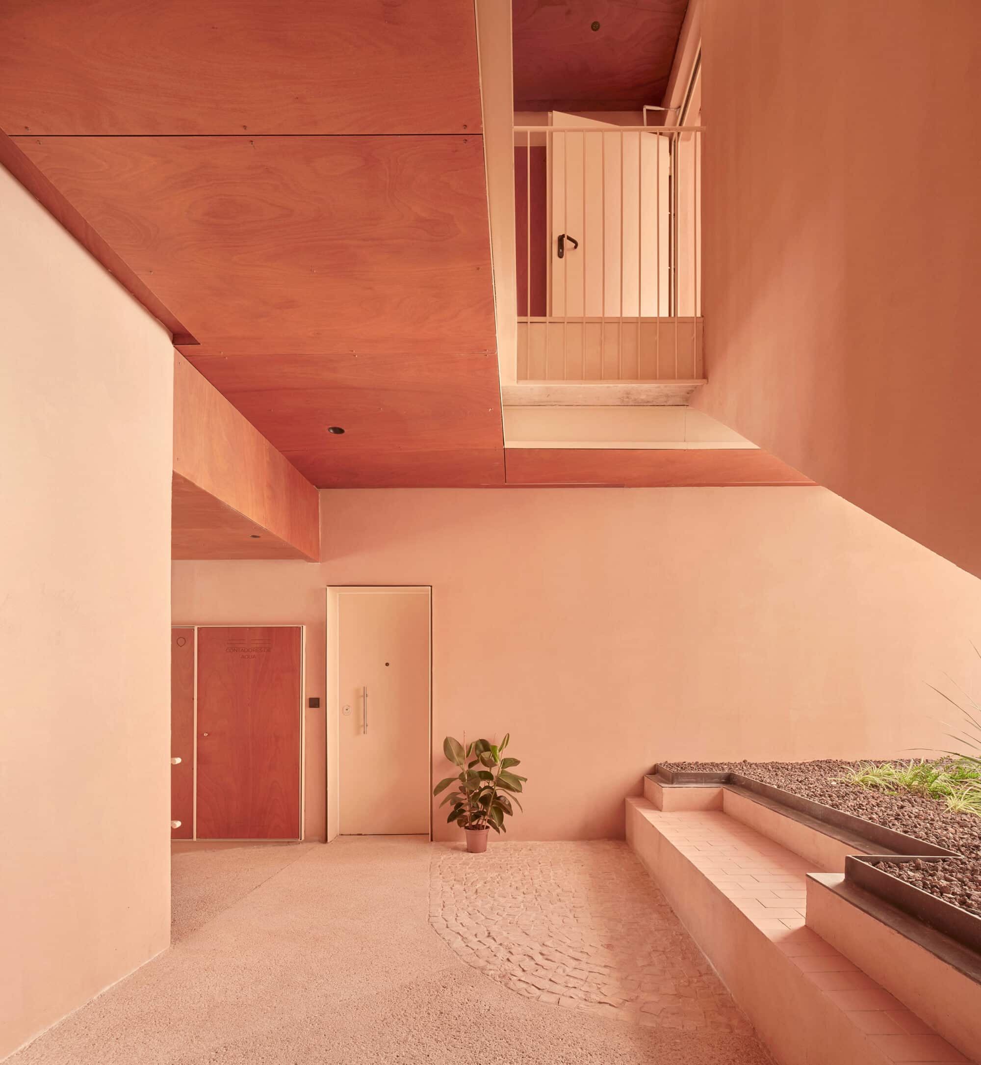 Parklex Prodema natural wood soffit clads the exterior communal areas in the 106-apartment building by MARMOLBRAVO and MADhel Architects.