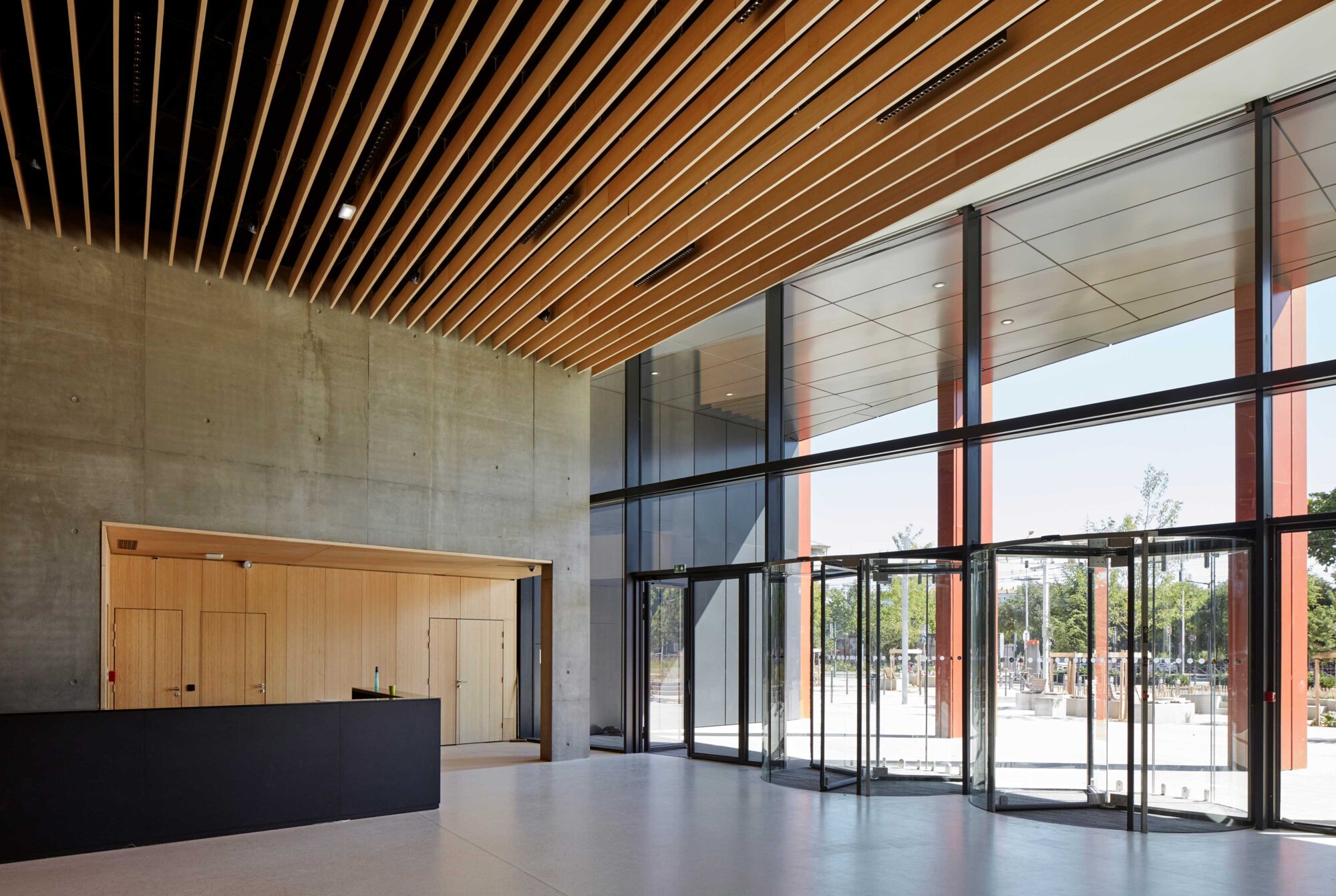 Parklex Prodema natural wood interior paneling and flooring at the Orange campus in Lyon by Hardel Le Bihan / HGA-Hubert Godet.