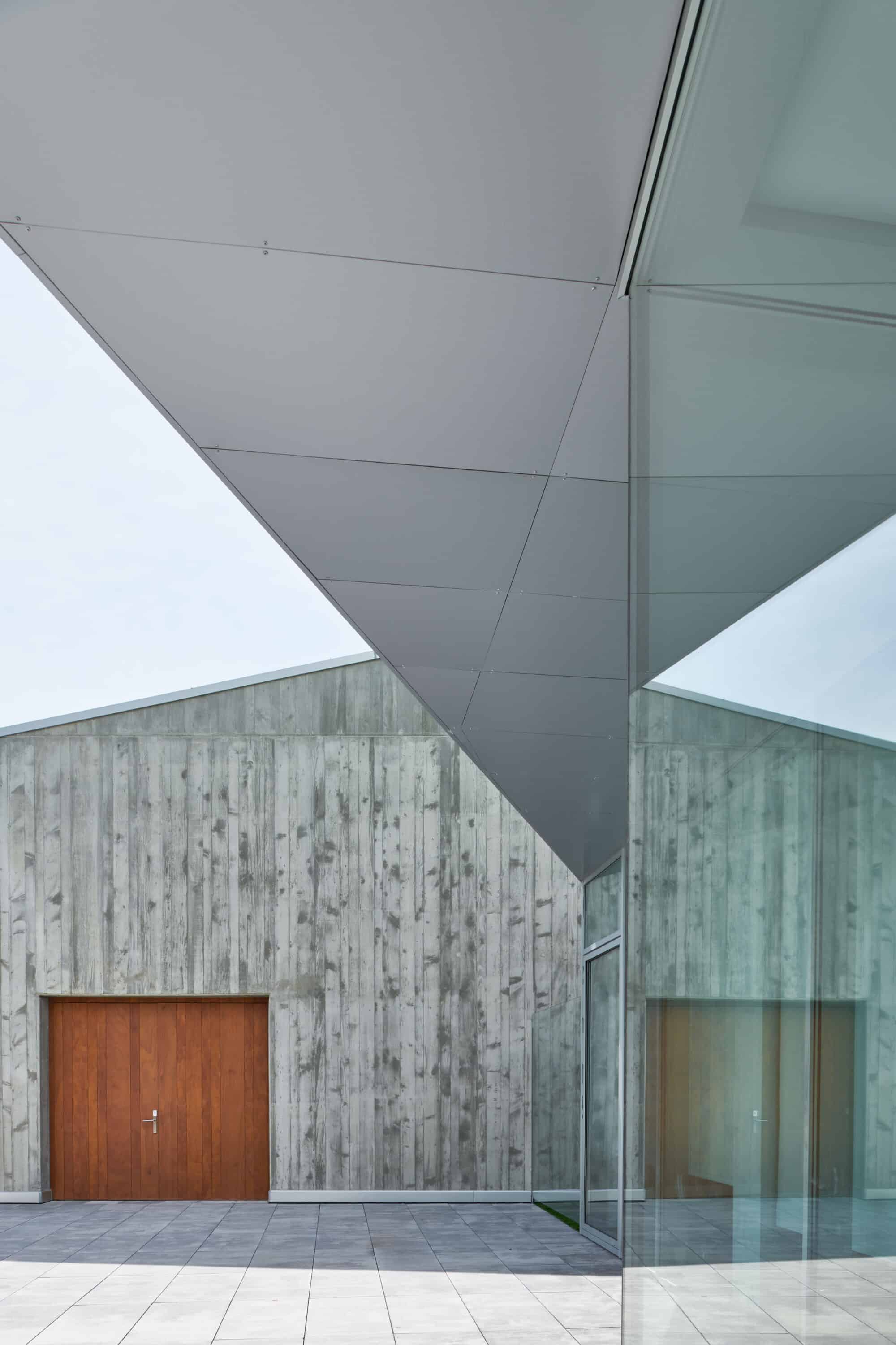 Natural wood cladding timber panels at Aldapeta María Ikastetxea School in San Sebastian